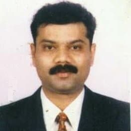 Image of Shri Ravindra Shanbhag.